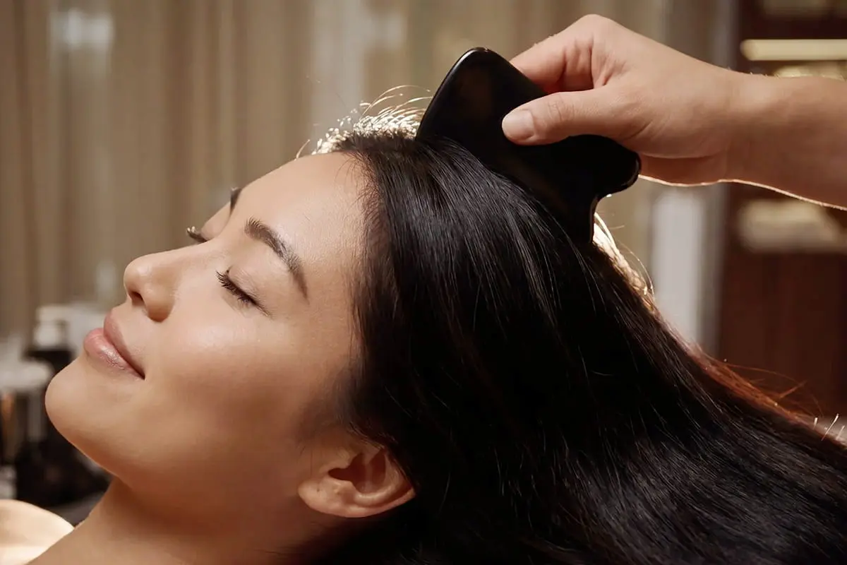 Scalp gua sha as part of hair-loss care at PULSE TCM