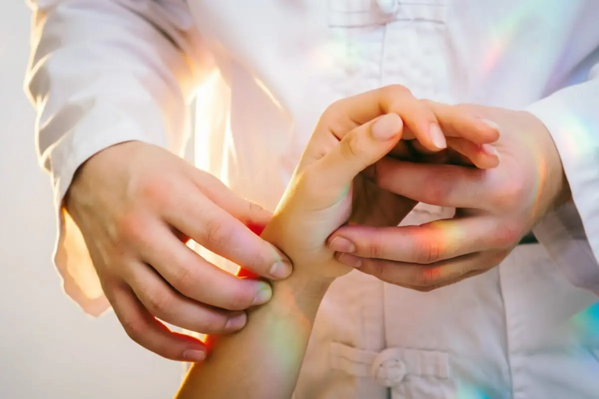 Pulse diagnosis during a weight-management consultation at PULSE TCM